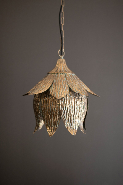 Lavisa antique brass tulip pendant light hanging elegantly over a modern kitchen counter