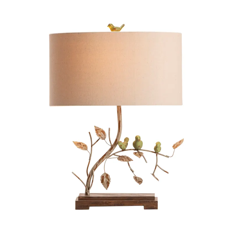 Lavisa nature-inspired table lamp with sculpted birds on a branch and a linen shade (View 2)