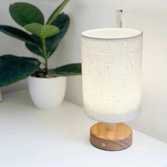 Lavisa Cordless Scandinavian Table Lamp with wooden base on a minimalist desk