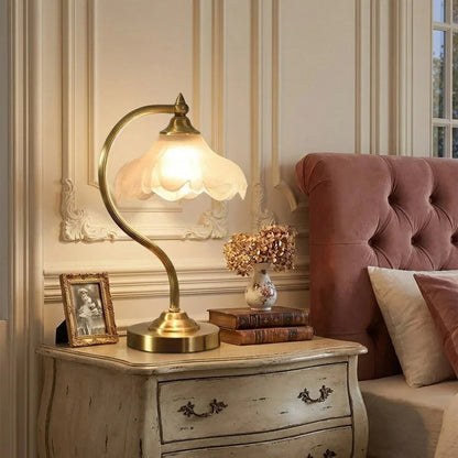 Lavisa floral brass and glass table lamp with polished metallic base for living room lighting