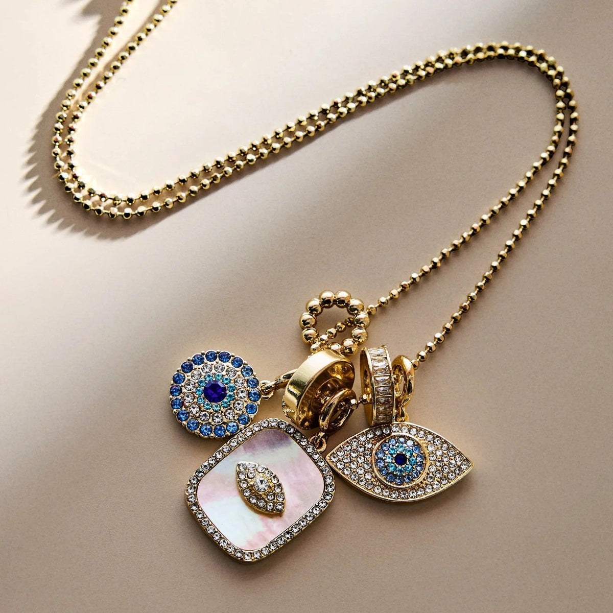 Lavisa turquoise evil eye charm necklace on a gold ball chain