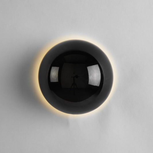 Lavisa modern metal wall sconce in sleek finish providing elegant lighting for interior walls