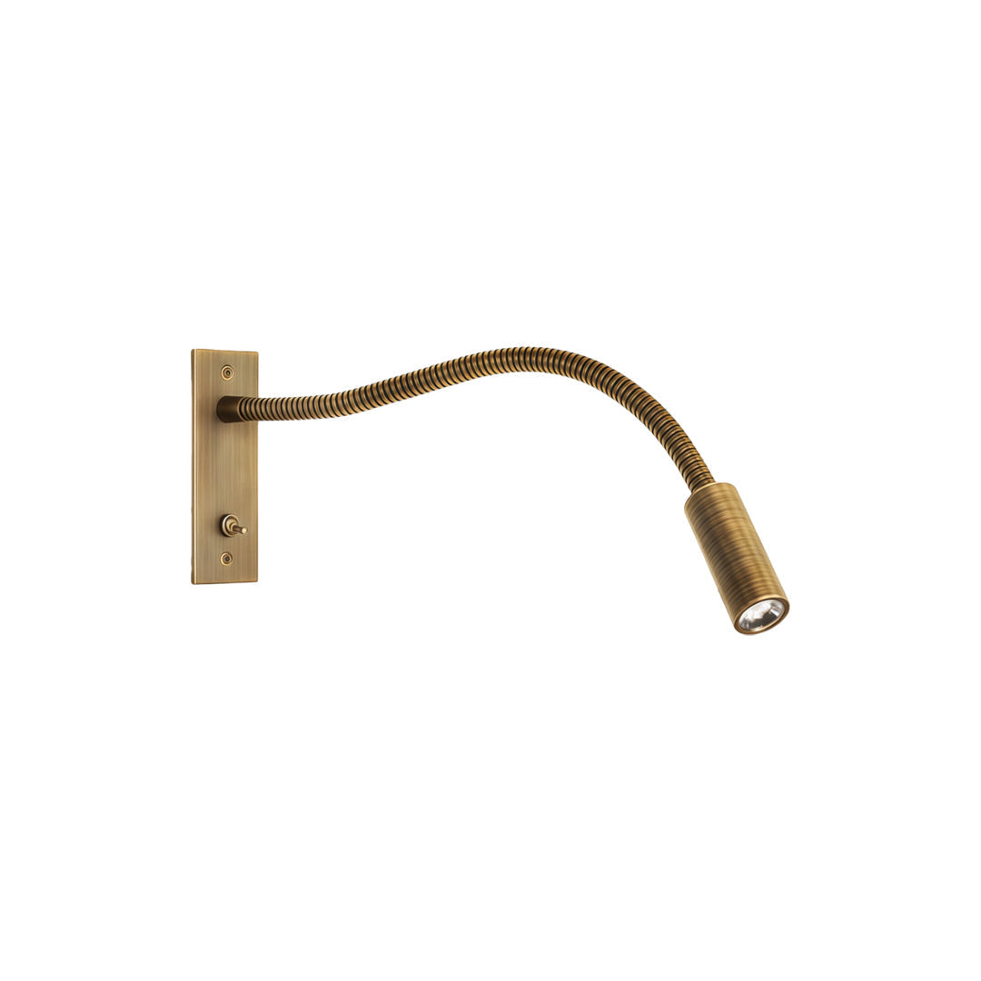 Lavisa Adjustable Swing Arm LED Wall Light mounted near a bed - Satin Nickel