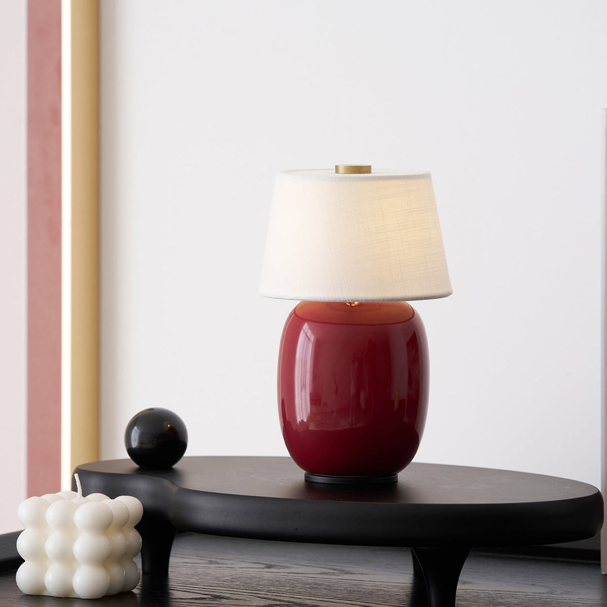 Lavisa Petite Battery Operated Table Lamp glowing on a wooden tabletop (View 8)