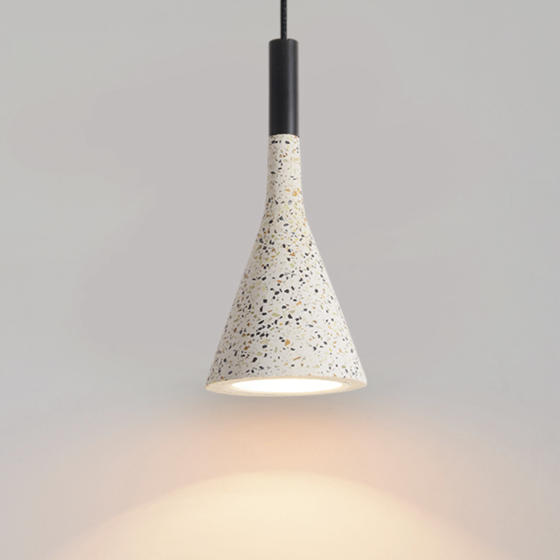 Lavisa Postmodern Terrazzo Pendant Light hanging over a modern dining table (View 9)