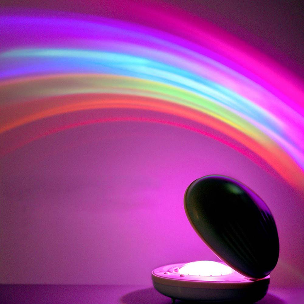 Lavisa Rainbow Night Light Projector projecting colorful waves across a bedroom wall