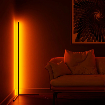 Lavisa minimalist RGB LED corner floor lamp casting colorful light in a room (View 11)