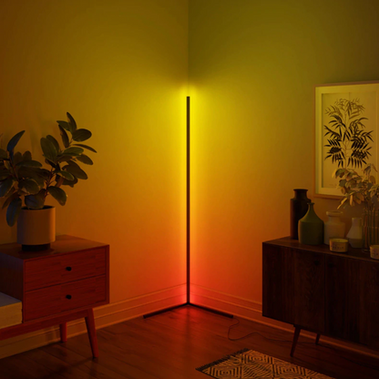 Lavisa minimalist RGB LED corner floor lamp casting colorful light in a room (View 10)