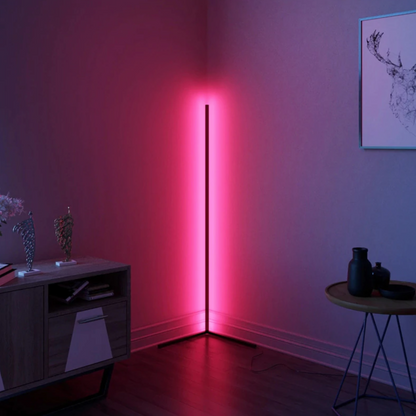 Lavisa minimalist RGB LED corner floor lamp casting colorful light in a room (View 9)