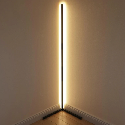 Lavisa minimalist RGB LED corner floor lamp casting colorful light in a room (View 2)