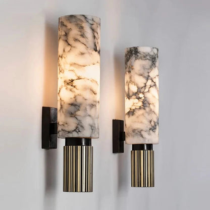 Lavisa Vertical Cylinder Wall Sconce made of real marble emitting a warm glow - Cool white
