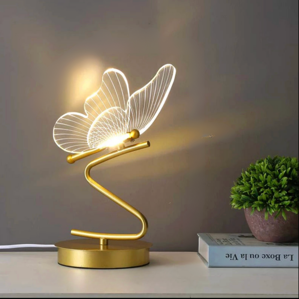 Lavisa Nordic Butterfly LED Table Lamp casting soft ambient glow (View 3)