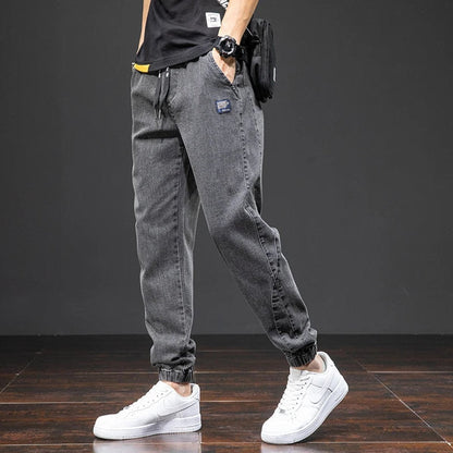 Men's Stretch Denim Elastic Waistband Jogger Trousers - Close-Up Texture & Detail | Lavisa