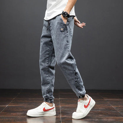 Men's Stretch Denim Elastic Waistband Jogger Trousers - Sole & Material View | Lavisa