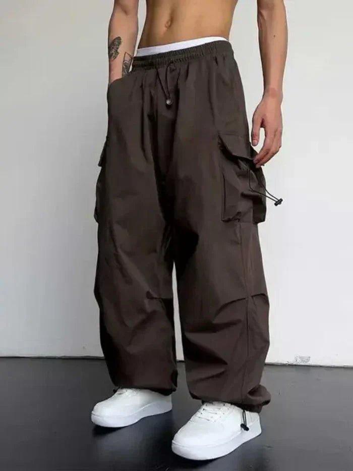 Men's Wide-Leg Cargo Trousers with Adjustable Toggle Cuffs - Side Angle | Lavisa