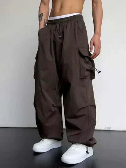 Men's Wide-Leg Cargo Trousers with Adjustable Toggle Cuffs - Side Angle | Lavisa