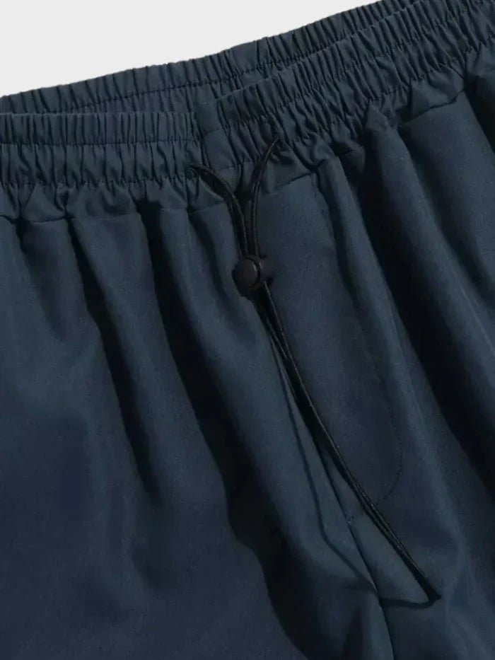 Men's Wide-Leg Cargo Trousers with Adjustable Toggle Cuffs - Close-Up Texture & Detail | Lavisa