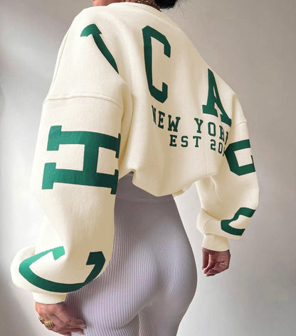 Women's Oversized Fleece-Lined Varsity Sleeve Crewneck Jumper - Side Angle | Lavisa