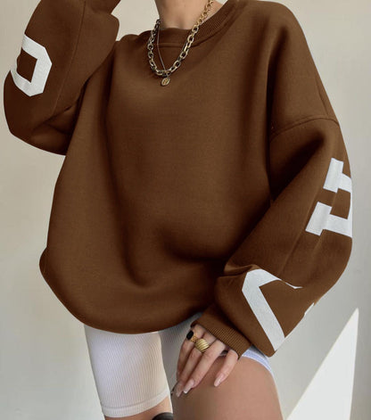 Women's Oversized Fleece-Lined Varsity Sleeve Crewneck Jumper - Sole & Material View | Lavisa