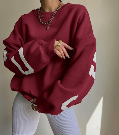 Women's Oversized Fleece-Lined Varsity Sleeve Crewneck Jumper - Lifestyle & Model Angle | Lavisa