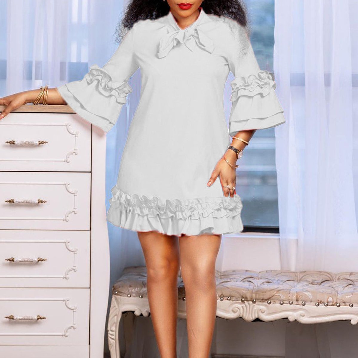 Women's Ruffle-Hem Bow-Neck Mini Tunic Dress - Close-Up Texture & Detail | Lavisa