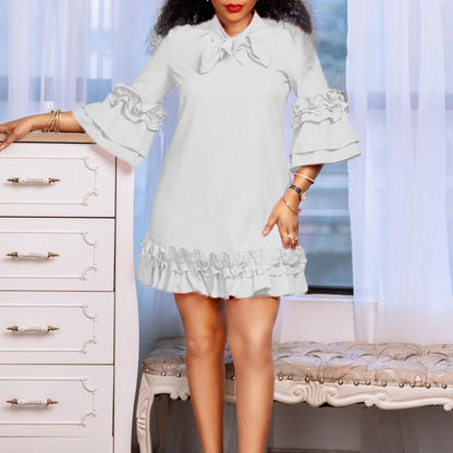 Women's Ruffle-Hem Bow-Neck Mini Tunic Dress - Close-Up Texture & Detail | Lavisa