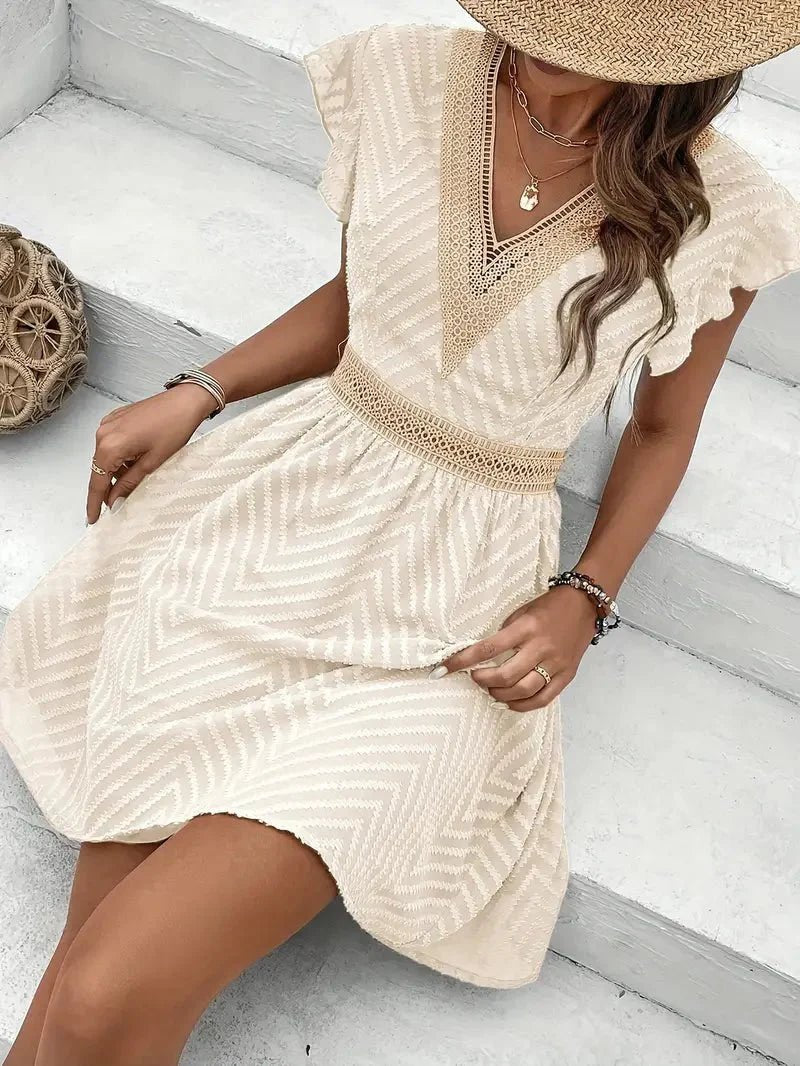 Women's V-Neck Lace-Trim Cap-Sleeve Flared Mini Dress - Sole & Material View | Lavisa