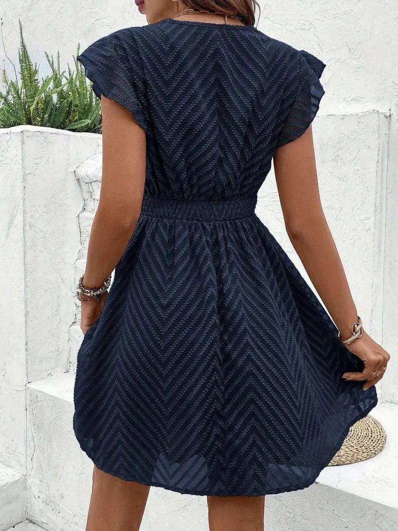 Women's V-Neck Lace-Trim Cap-Sleeve Flared Mini Dress - Lifestyle & Model Angle | Lavisa